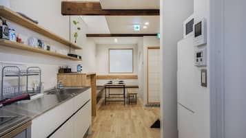 Fridge, microwave, toaster oven, cookware/dishes/utensils