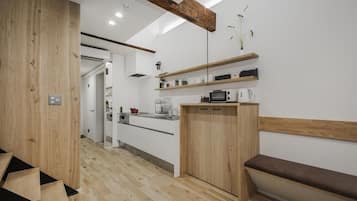 Fridge, microwave, toaster oven, cookware/dishes/utensils