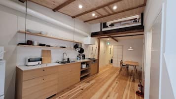 Fridge, microwave, cookware/dishes/utensils