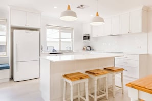 Coffee/tea maker, fridge, microwave, oven