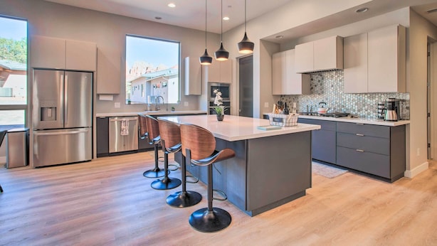 A modern kitchen with a central island, stainless steel appliances, and pendant lighting. - Sedona Sanctuary w/ Hot Tub, Fire Pit & Grill (Sedona)