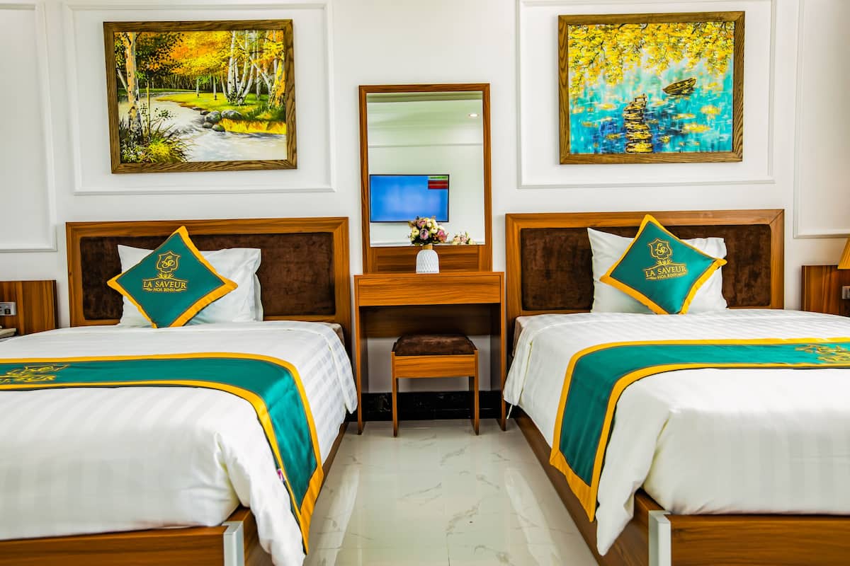 Habitación Deluxe con 2 camas individuales | 1 dormitorio, ropa de cama hipoalergénica, minibar y caja fuerte