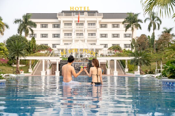 Outdoor pool, open 6:00 AM to 9:00 PM, sun loungers