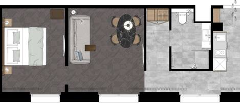 Distribución de una habitación de hotel con cama, mesita de noche y una pequeña zona de estar con mesa y sillas.