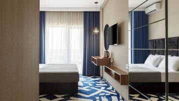 Family Room | 1 bedroom, in-room safe, free WiFi, bed sheets