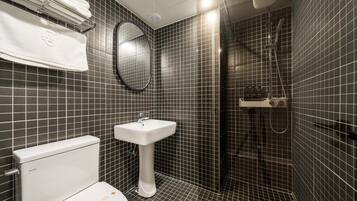 Standard Room | Bathroom | Hair dryer, bathrobes, towels, soap