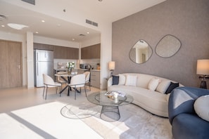 Appartement familial | Aire de séjour | Téléviseur connecté de 55 po avec télévision par câble, téléviseur