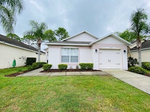 Stylish home with a simple, modern design and a beautifully maintained garden.