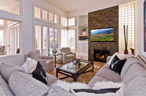TV, fireplace, Netflix, streaming services - Casa Del Rio | Luxe 3BR w/ Pool, Spa & Lake Views (La Quinta)