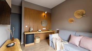 Standard Suite, 1 Bedroom, Balcony, City View | Living area | 32-inch flat-screen TV with digital channels