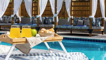 Seasonal outdoor pool, pool umbrellas, pool loungers
