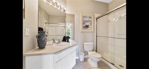 Combined shower/tub, hair dryer, towels, shampoo