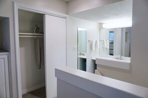 Bathtub, hair dryer, towels