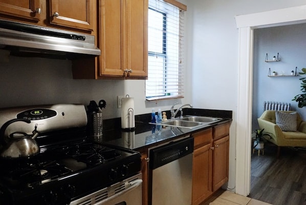 Fridge, microwave, cookware/dishes/utensils