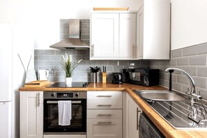 Fridge, microwave, oven, toaster - Naphtali Suite by Koya Homes (Barry)
