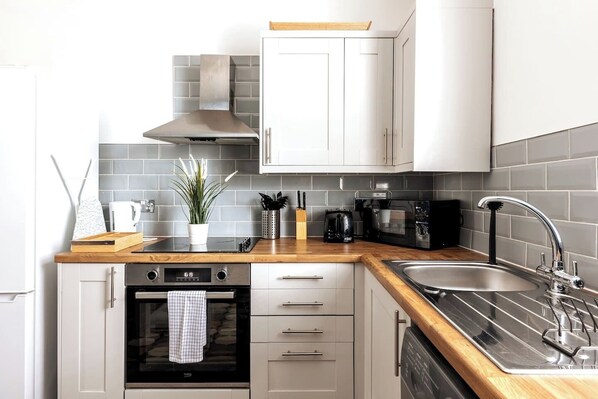 Fridge, microwave, oven, toaster - Naphtali Suite by Koya Homes (Barry)