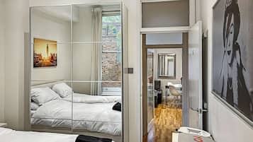 2 habitaciones, tabla de planchar con plancha, wifi y ropa de cama
