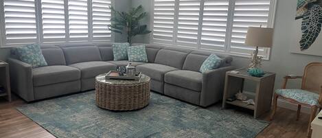 Smart TV, fireplace, books, printers