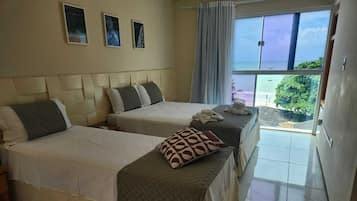 Family Quadruple Room, 1 Bedroom, Ocean View | Minibar, WiFi (free), individually decorated, bed sheets