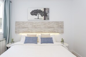 4 slaapkamers, een strijkplank/strijkijzer, reisbedje, gratis wifi