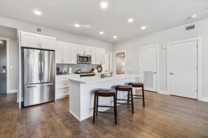 Fridge, microwave, oven, stovetop - 2 Bedroom Luxury Condo In Bywater New Orleans! (New Orleans)