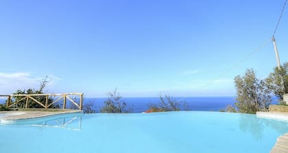 Villa Gaia: A bright and sunny two-story villa located on the slope of a hill, facing the sea, with Free WI-FI.