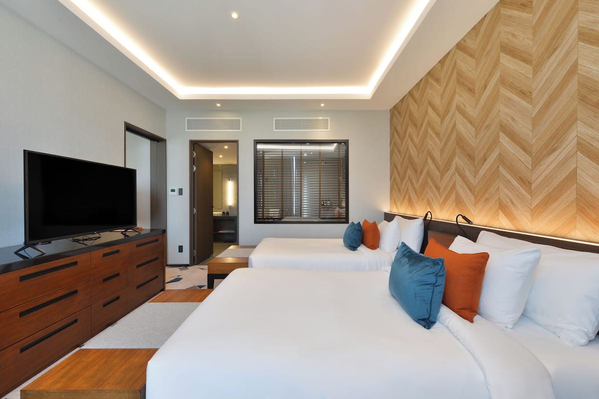 Suite empresarial, 2 camas individuales | 1 habitación, caja de seguridad en la habitación y escritorio
