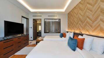 Suite Affaires, 2 lits une place | Coffres-forts dans les chambres, bureau