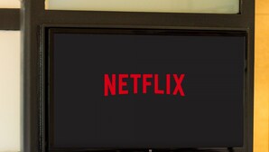 A television with the Netflix logo on a black frame.