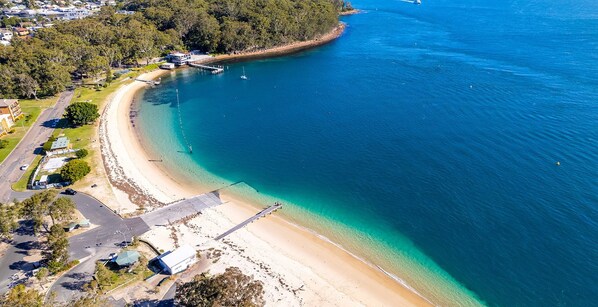 Enjoy access to the pristine beach and clear blue sea from this coastal property.