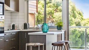 Dishwasher, coffee/tea maker, cookware/dishes/utensils