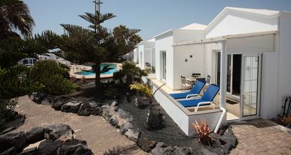 C1, in a small complex with communal heated pool 100m from the sea