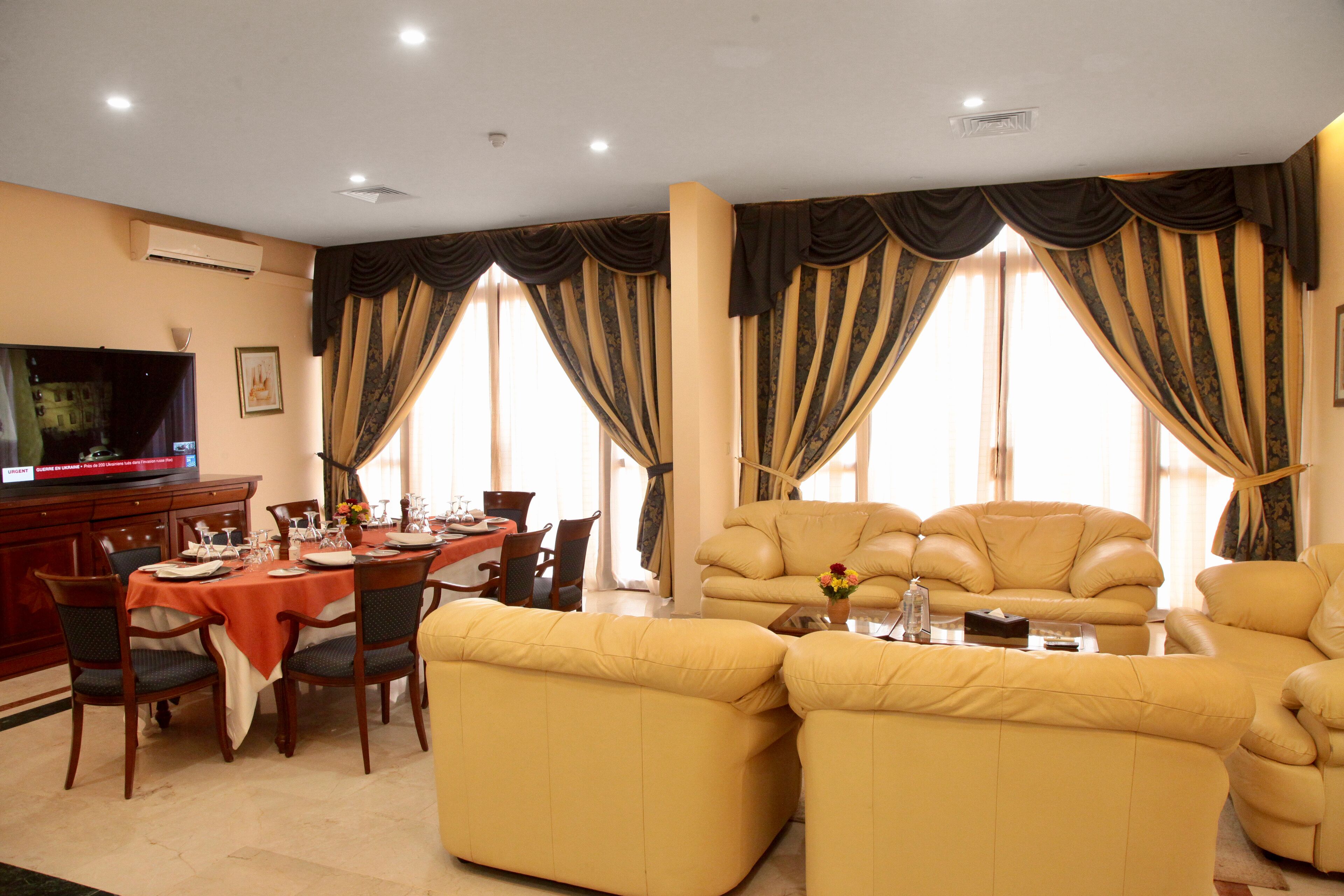 presidential suite | living area | 60-inch led tv with cable channels, tv, fireplace