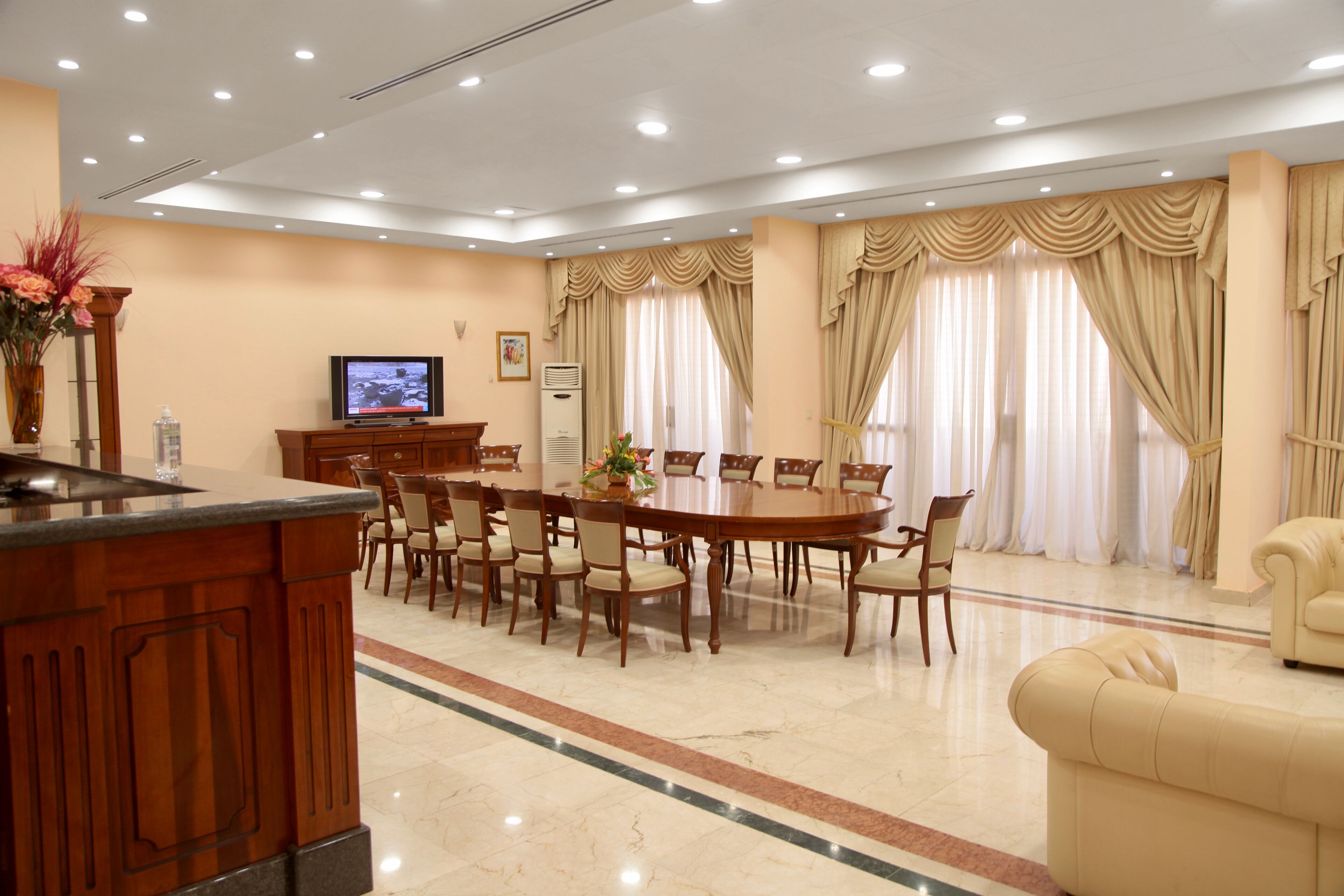presidential suite | living area | 60-inch led tv with cable channels, tv, fireplace