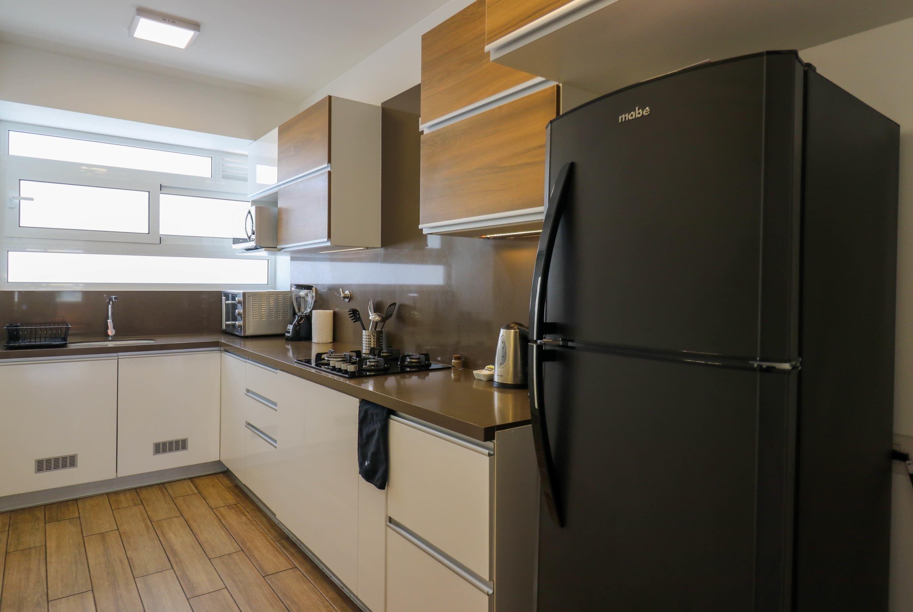 Fridge, microwave, stovetop, coffee/tea maker