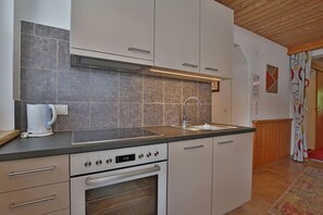 Apartamento, banheiro privativo, vista para a montanha | Cozinha compartilhada