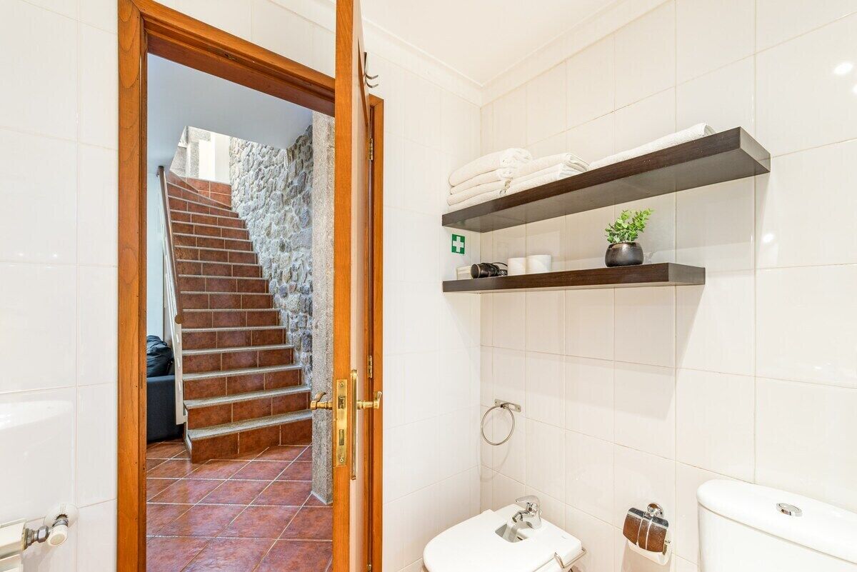 Bathtub, hair dryer, towels