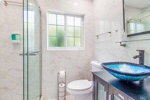 Hair dryer, towels, soap, shampoo