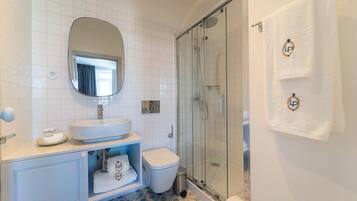 Hair dryer, towels, soap, toilet paper