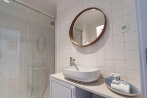 Hair dryer, towels, soap, toilet paper