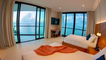 Deluxe Room, 2 Double Beds, Non Smoking, Ocean View | Minibar, in-room safe, individually decorated, desk