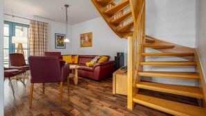 TV, fireplace, ping pong, stereo - Semi-detached house with sauna, garden and heated pool in the Freesenbruch vacation park (Zingst)