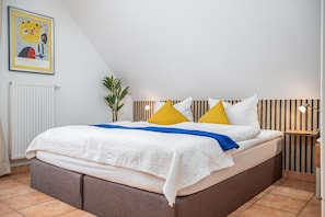 3 slaapkamers, een bureau, een strijkplank/strijkijzer, wifi