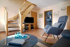 Televisión, reproductor de DVD, tenis de mesa y estéreo