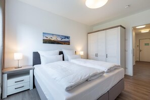 2 habitaciones, tabla de planchar con plancha, wifi y ropa de cama
