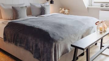 3 slaapkamers, een kluis op de kamer, een bureau