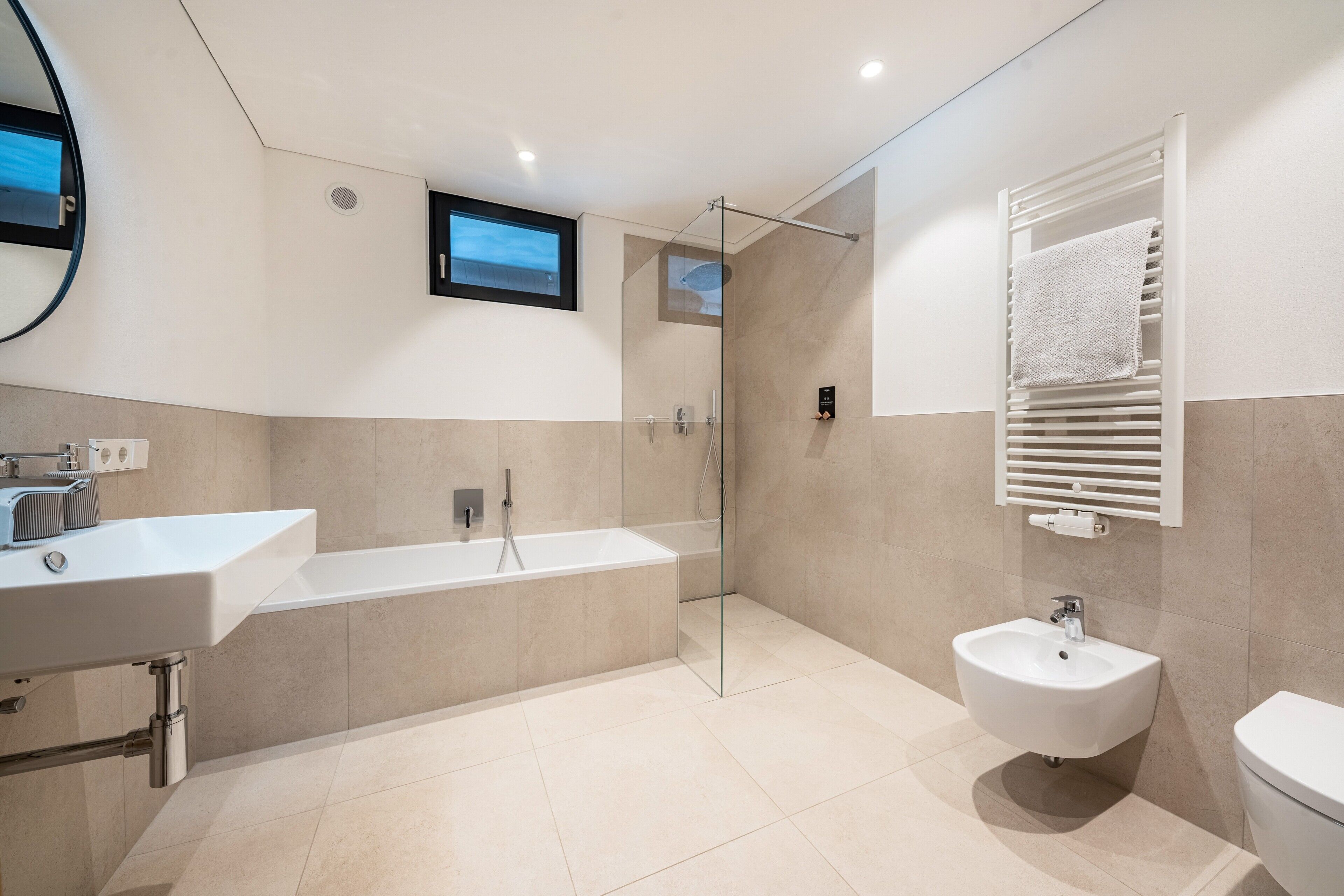 Bathtub, hair dryer, towels