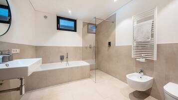Bathtub, hair dryer, towels