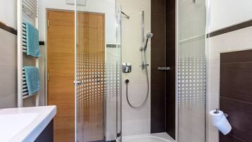 Bathtub, hair dryer, towels