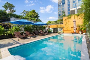 Outdoor pool, open 6:00 AM to 8:00 PM, sun loungers